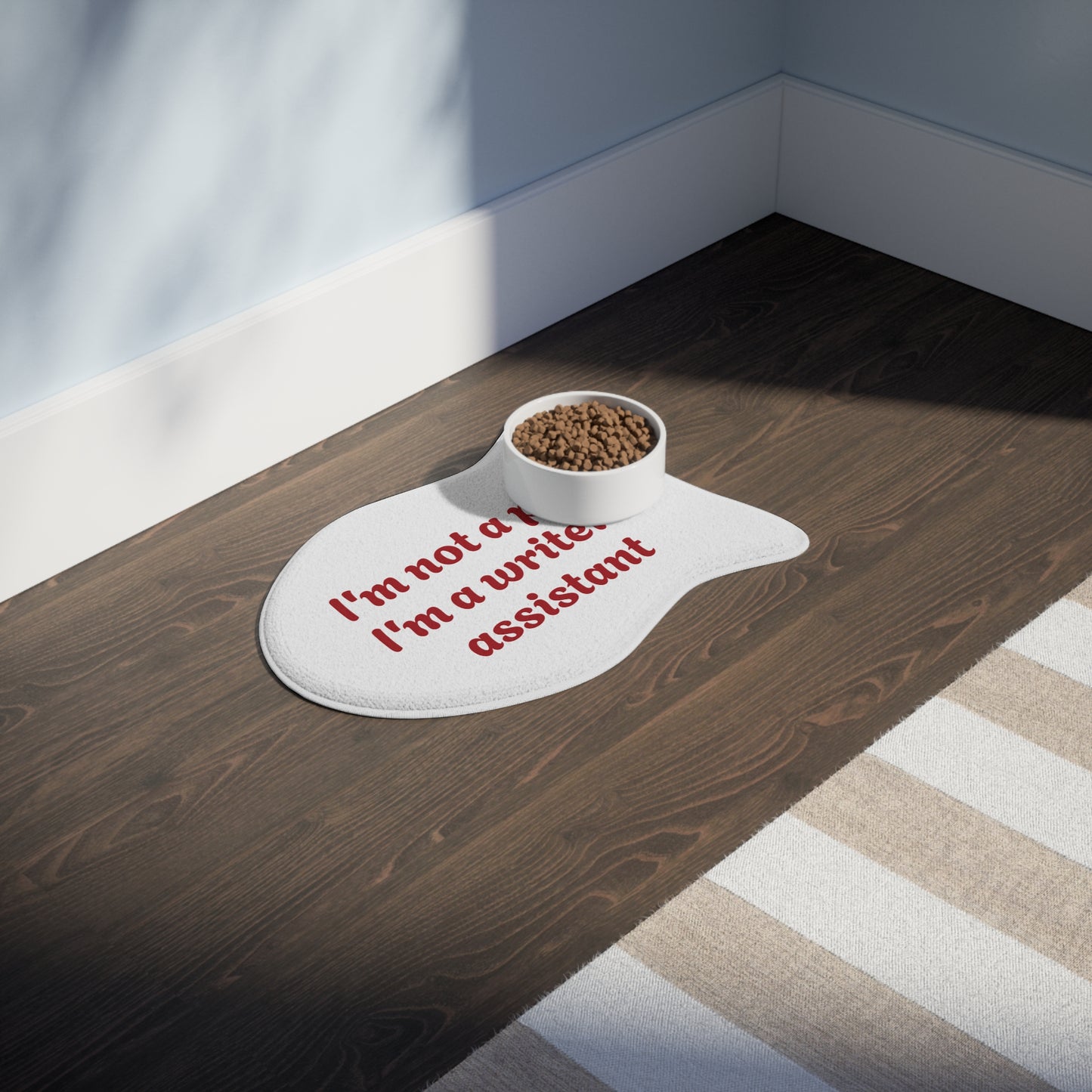 Funny Pet Feeding Mat - "I'm Not a Pet, I'm a Writer's Assistant" - The Dreamer's Bookshop.
