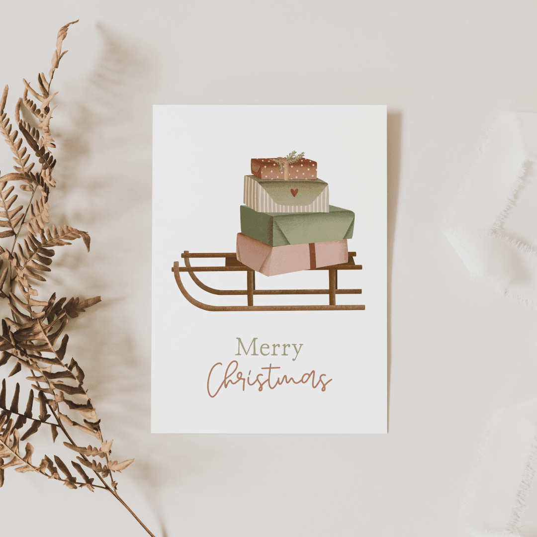 Tilda&Theo - Kerstkaart slee cadeaus - Kerstkaart - The Dreamer's Bookshop.