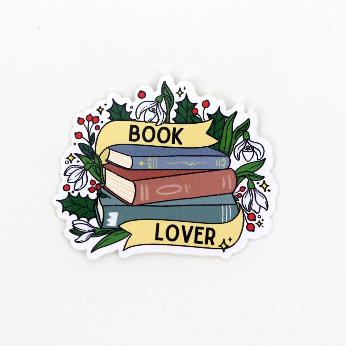 Boekliefhebber met vinylsticker - The Dreamer's Bookshop.